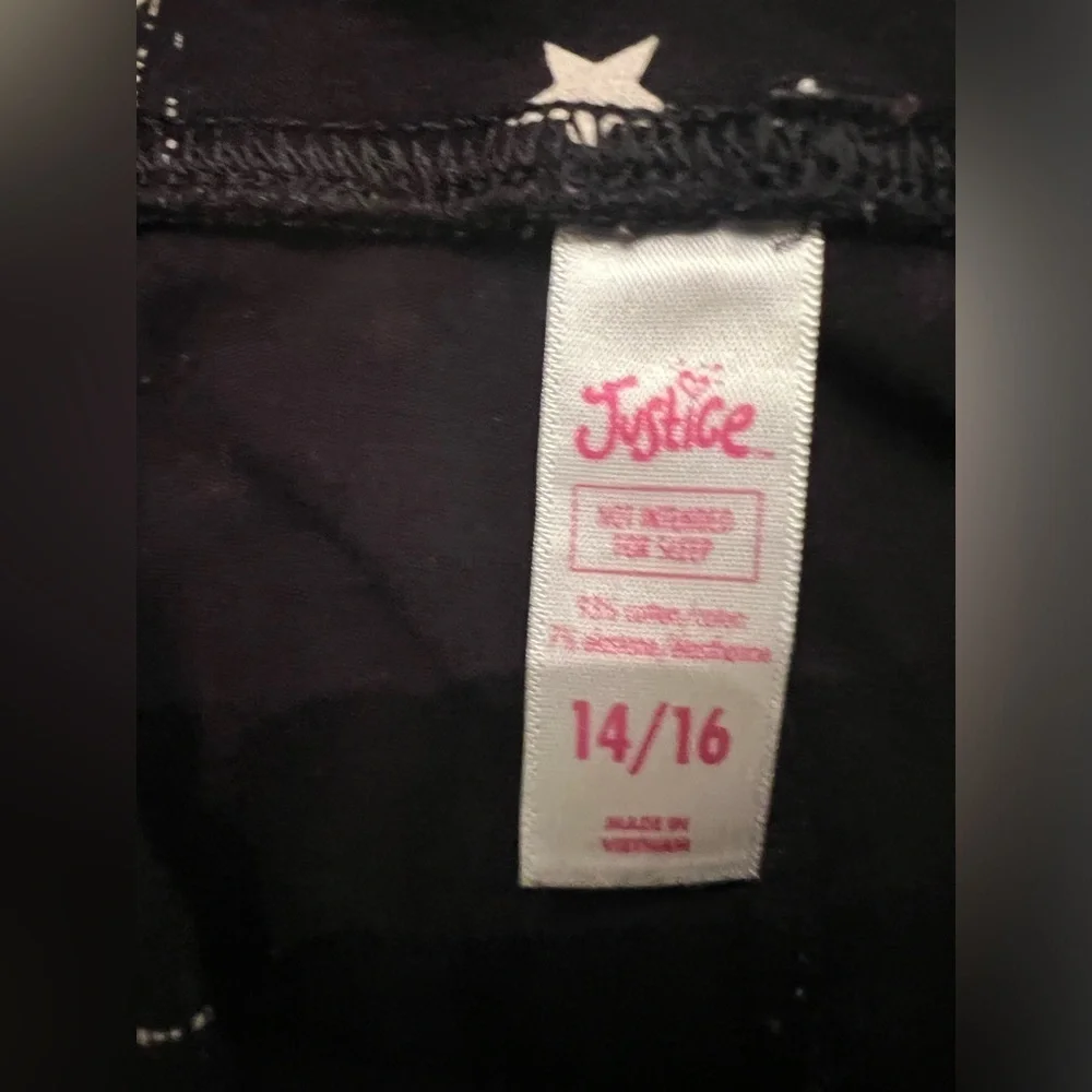 JUSTICE GIRLS LEGGINGS. SIZE 14/16  BLACK WITH STARS AND LINES